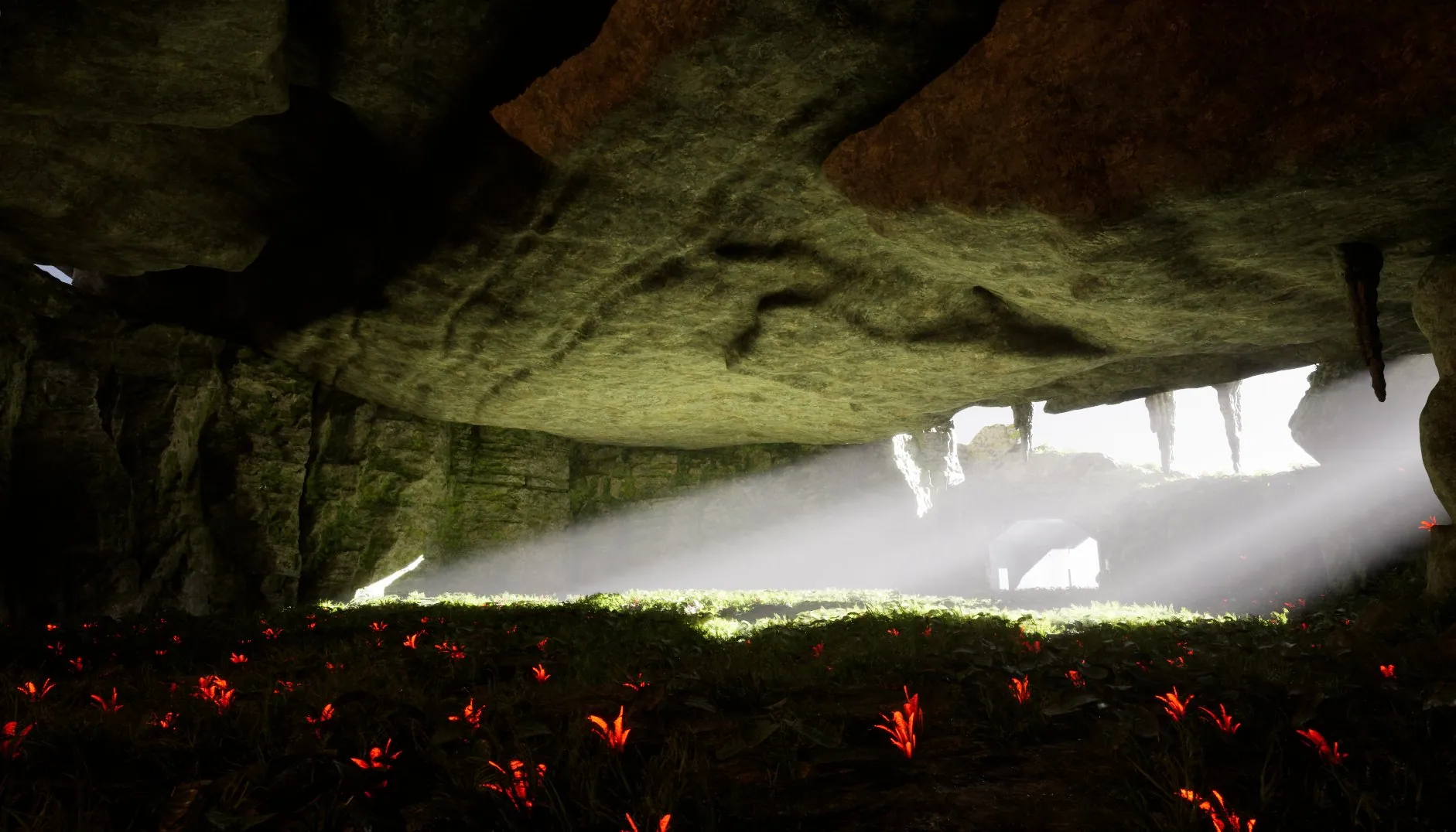 A dark cave lit by a shaft of light, with red crystals on the ground.